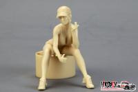 1:24 Pretty Lady (E) Sitting with Helmet and Spanner
