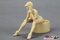 1:24 Pretty Lady (E) Sitting with Helmet and Spanner
