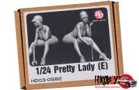 1:24 Pretty Lady (E) Sitting with Helmet and Spanner
